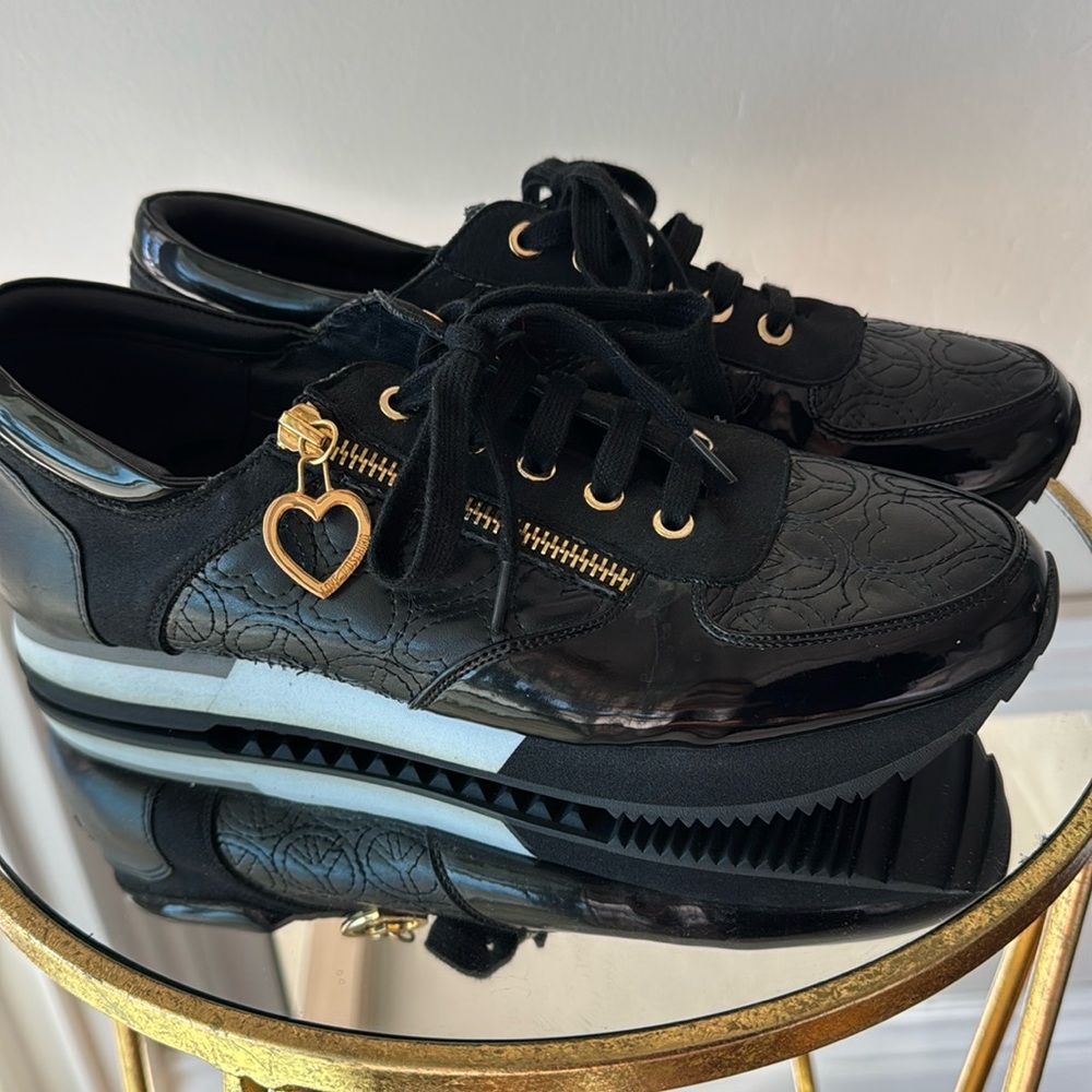 Love Moschino patent, suede, and leather tennis shoes.